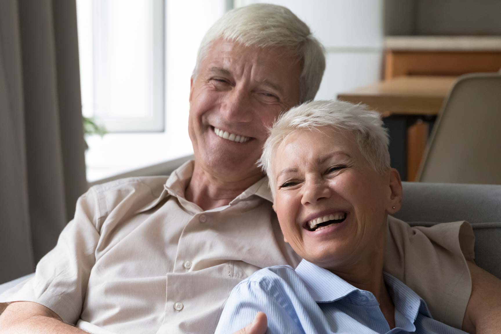 Smiling couple at home